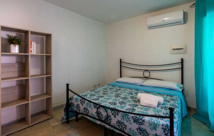 Imagen de la habitación del Residencia il Girasole, Golfo Aranci. Foto 14