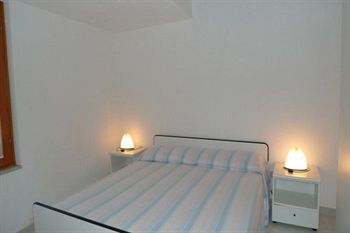 Imagen de la habitación del Resort Capo Ceraso Family. Foto 6