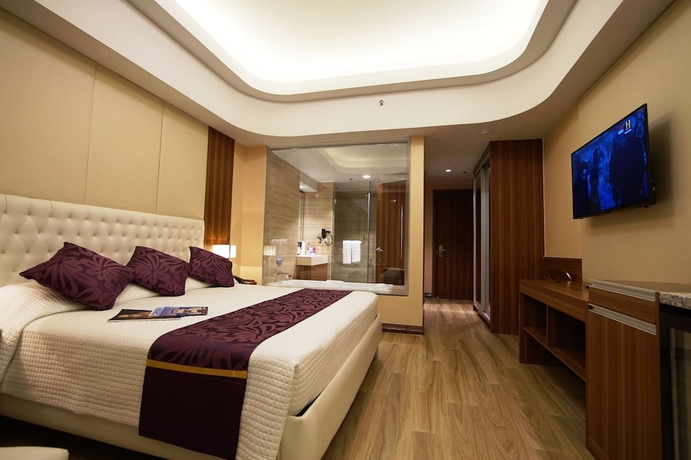 Imagen de la habitación del Resort Central Park Reef. Foto 6