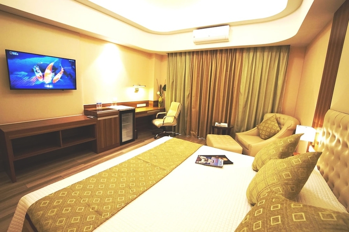 Imagen de la habitación del Resort Central Park Reef. Foto 13