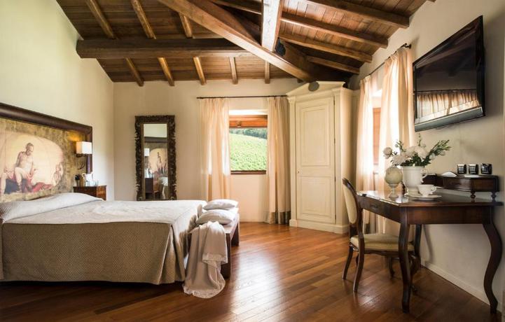 Imagen de la habitación del Resort Hotel Villa Campomaggio. Foto 4