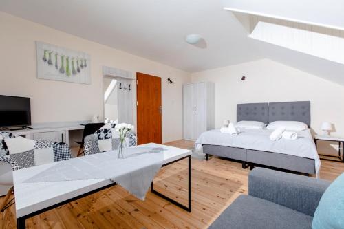 Imagen de la habitación del Resort OŚRODEK KOLONIJNO WCZASOWY MEWA - przy plaży z basenem z podgrzewaną wodą i mini SPA. Foto 2