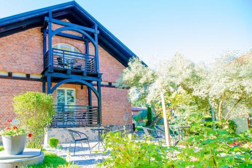 Imagen de los exteriores del Resort OŚRODEK KOLONIJNO WCZASOWY MEWA - przy plaży z basenem z podgrzewaną wodą i mini SPA. Foto 6