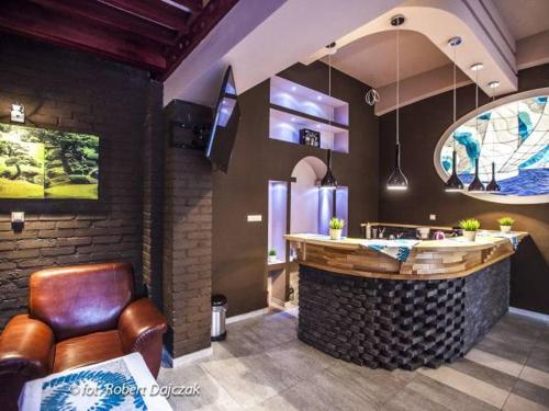 Imagen de los interiores del Resort OŚRODEK KOLONIJNO WCZASOWY MEWA - przy plaży z basenem z podgrzewaną wodą i mini SPA. Foto 7