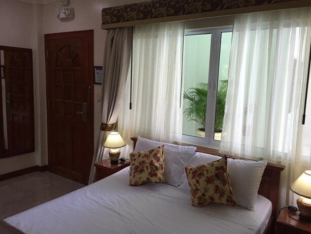 Imagen de la habitación del Resort Ocean Breeze. Foto 25