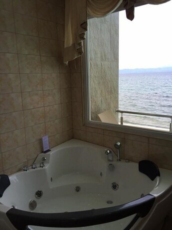 Imagen de la habitación del Resort Ocean Breeze. Foto 26
