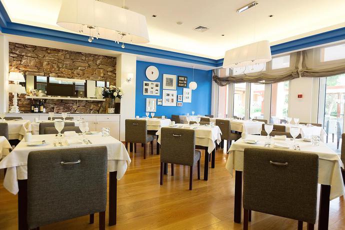 Imagen del bar/restaurante del Resort Onyria Quinta da Marinha Hotel & Villas. Foto 11