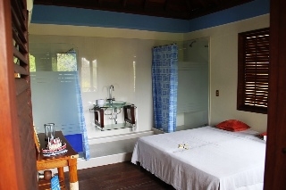 Imagen de la habitación del Resort Rosario De Mar Ecohotel. Foto 12