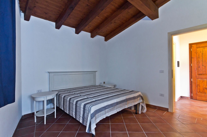 Imagen de la habitación del Resort Stintino Country Paradise Villas and. Foto 3