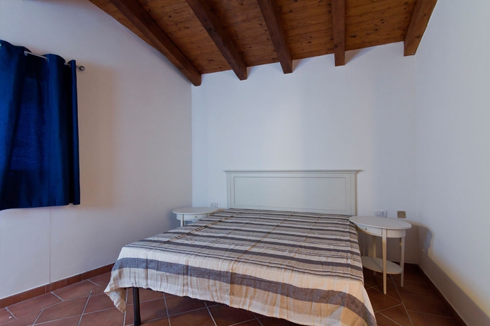 Imagen de la habitación del Resort Stintino Country Paradise Villas and. Foto 5