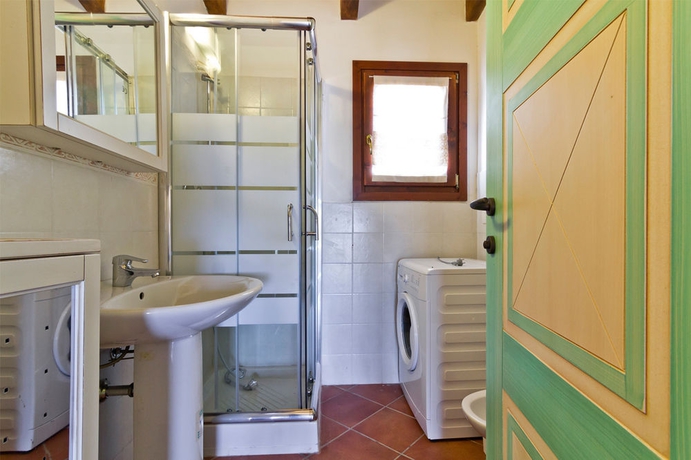 Imagen de la habitación del Resort Stintino Country Paradise Villas and. Foto 7