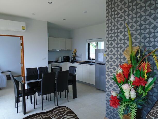 Imagen de la habitación del Resort Sunrise Villa Resort. Foto 3