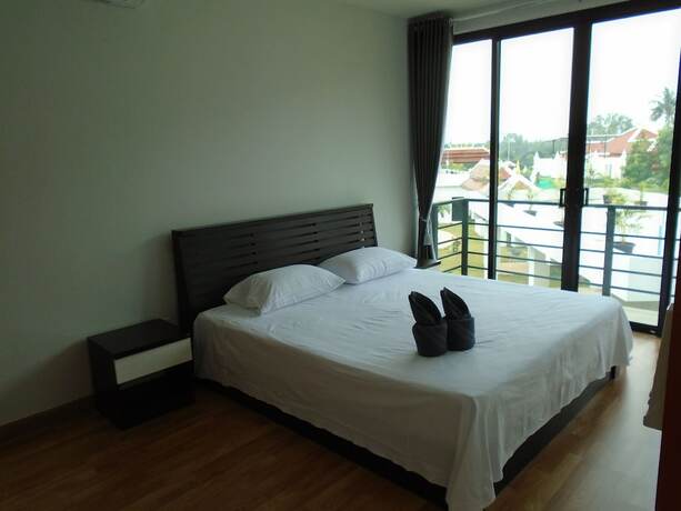 Imagen de la habitación del Resort Sunrise Villa Resort. Foto 4
