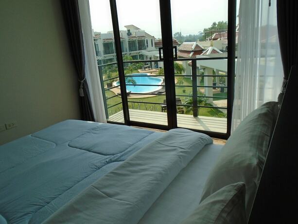 Imagen de la habitación del Resort Sunrise Villa Resort. Foto 5