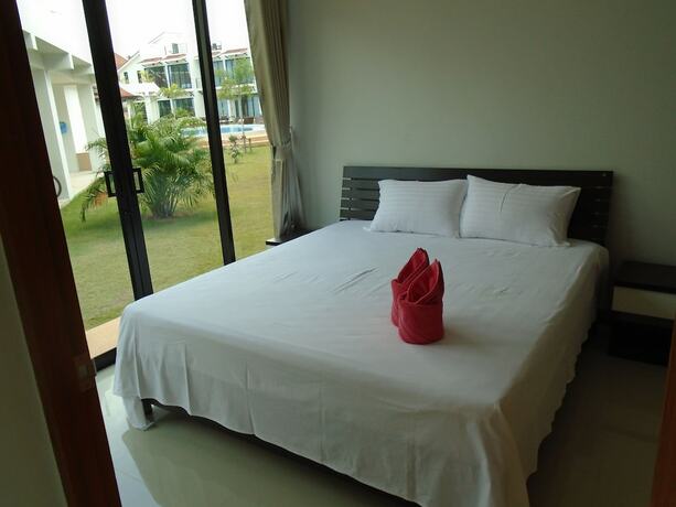 Imagen de la habitación del Resort Sunrise Villa Resort. Foto 8