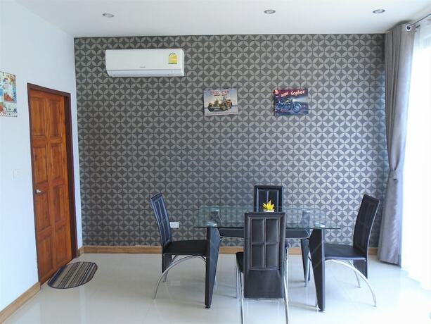 Imagen de la habitación del Resort Sunrise Villa Resort. Foto 9