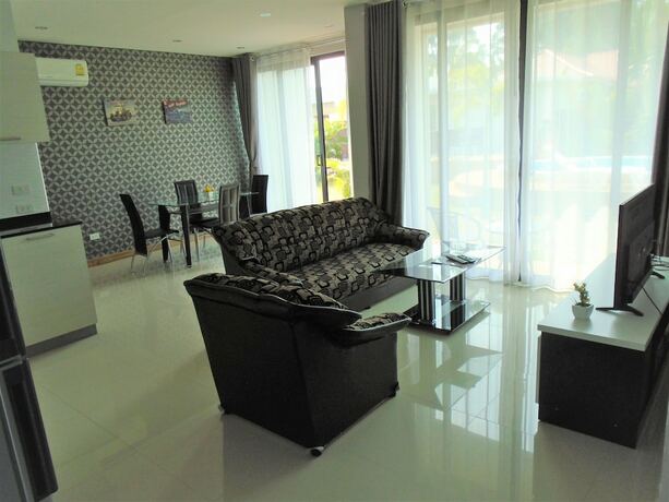 Imagen de la habitación del Resort Sunrise Villa Resort. Foto 10