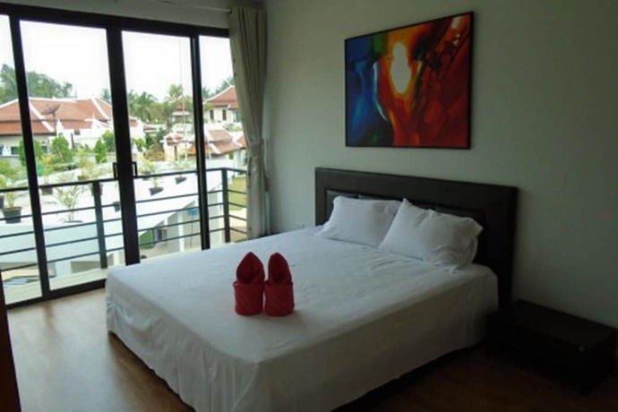 Imagen de la habitación del Resort Sunrise Villa Resort. Foto 14