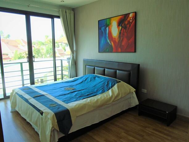 Imagen de la habitación del Resort Sunrise Villa Resort. Foto 15