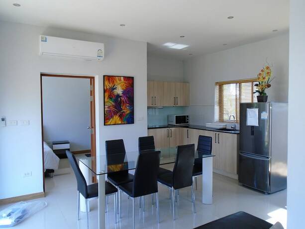 Imagen de la habitación del Resort Sunrise Villa Resort. Foto 16