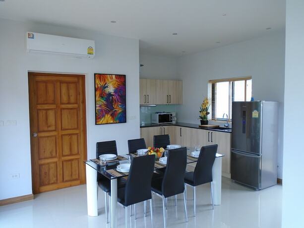Imagen de la habitación del Resort Sunrise Villa Resort. Foto 17