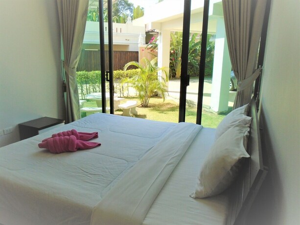 Imagen de la habitación del Resort Sunrise Villa Resort. Foto 19
