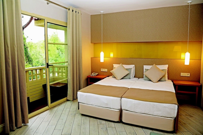 Imagen de la habitación del Resort Ulusoy Kemer Holiday Club. Foto 12