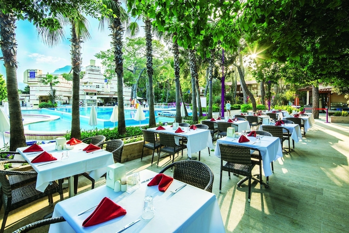 Imagen del bar/restaurante del Resort Ulusoy Kemer Holiday Club. Foto 1