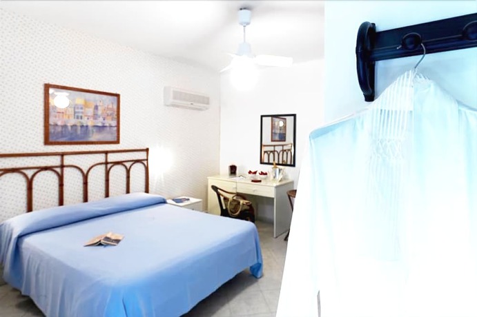 Imagen de la habitación del Resort Villaggio Le Palme. Foto 3