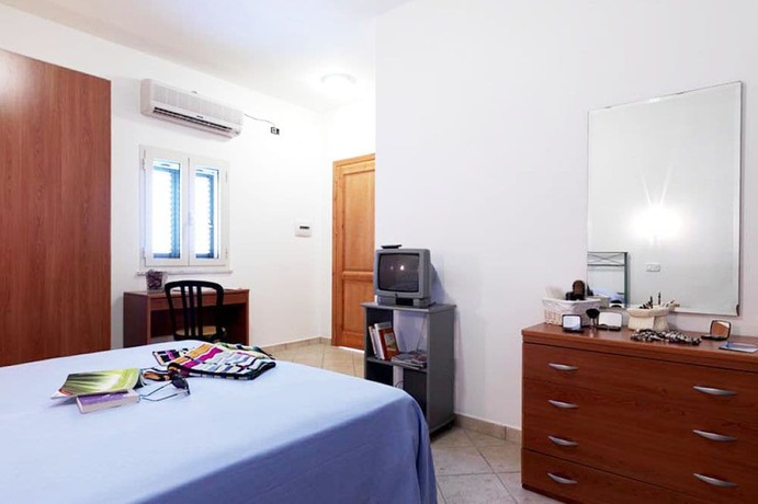 Imagen de la habitación del Resort Villaggio Le Palme. Foto 8