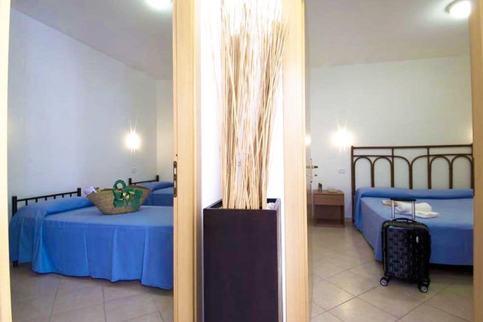 Imagen de la habitación del Resort Villaggio Le Palme. Foto 11