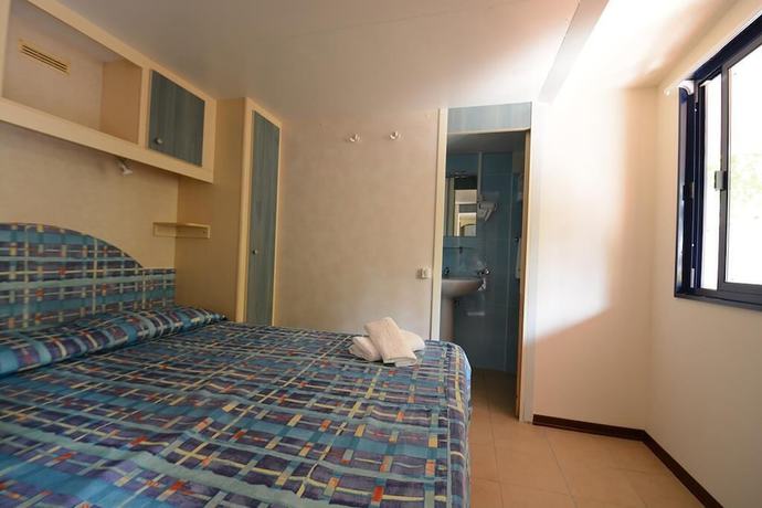 Imagen de la habitación del Resort Villaggio Le Palme. Foto 12