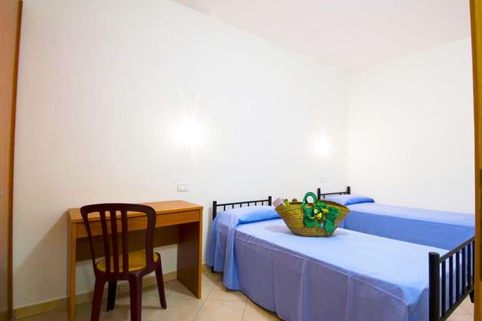 Imagen de la habitación del Resort Villaggio Le Palme. Foto 16