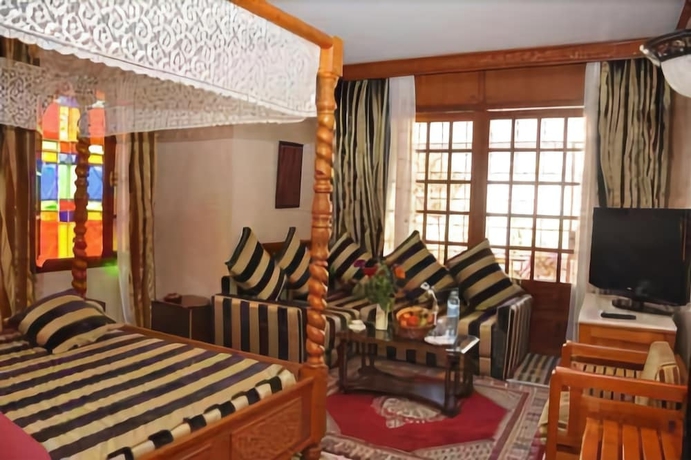 Imagen de la habitación del Riad Alhambra, El Harhoura. Foto 2