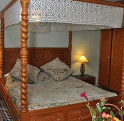 Imagen de la habitación del Riad Alhambra, El Harhoura. Foto 8