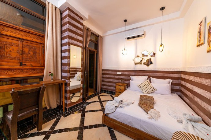 Imagen de la habitación del Riad Ambre et Jasmin. Foto 11