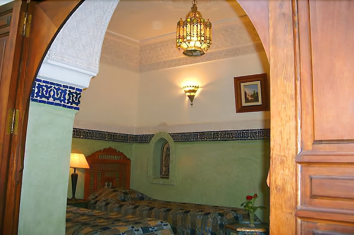 Imagen de la habitación del Riad Dar Al Kounouz. Foto 12