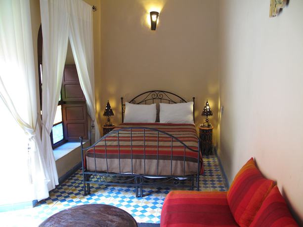Imagen de la habitación del Riad Dar Tamlil. Foto 3