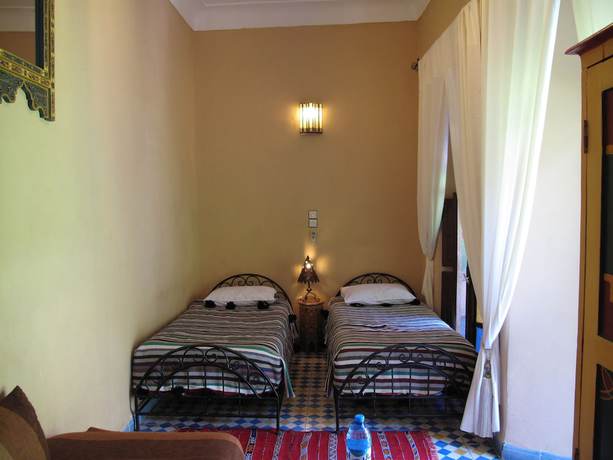 Imagen de la habitación del Riad Dar Tamlil. Foto 10