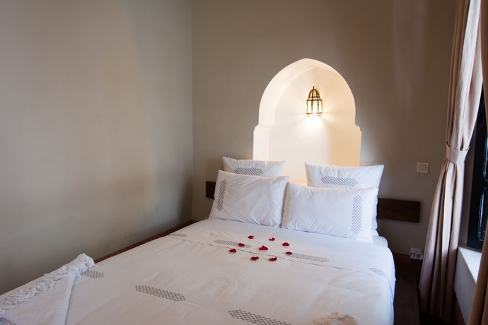 Imagen de la habitación del Riad El Gnaouia. Foto 5