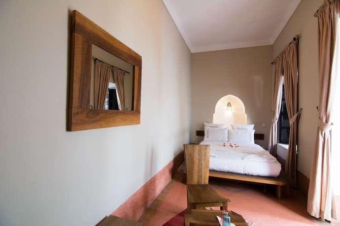 Imagen de la habitación del Riad El Gnaouia. Foto 12