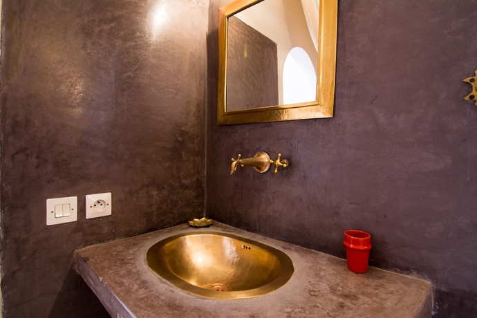 Imagen de la habitación del Riad El Gnaouia. Foto 15