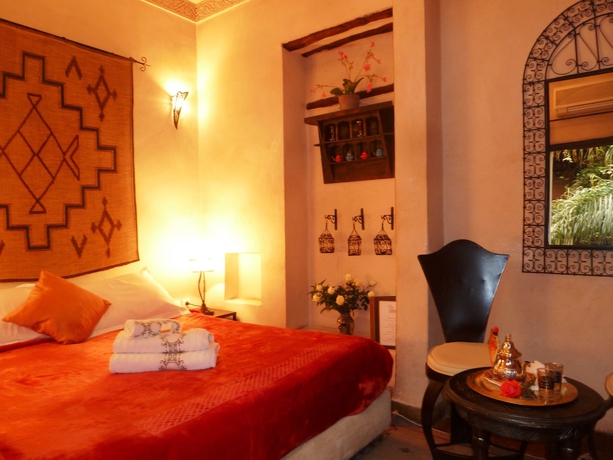 Imagen de la habitación del Riad Hotel Carina. Foto 11