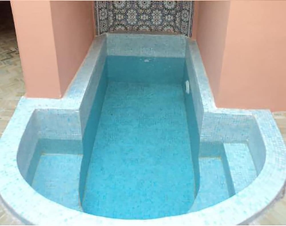Imagen de la piscina del Riad La Perle De Marrakech. Foto 17