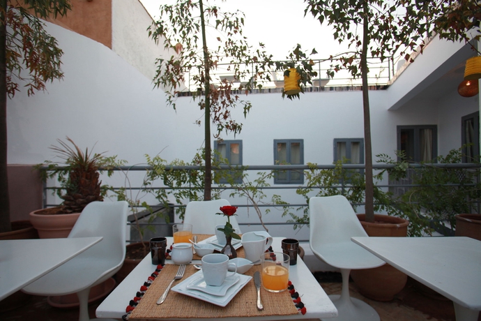 Imagen del bar/restaurante del Riad Les Jardins Des Lilas. Foto 6