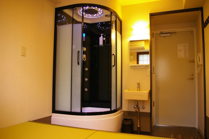 Imagen de la habitación del Ryokan Capsule Kyoto. Foto 4