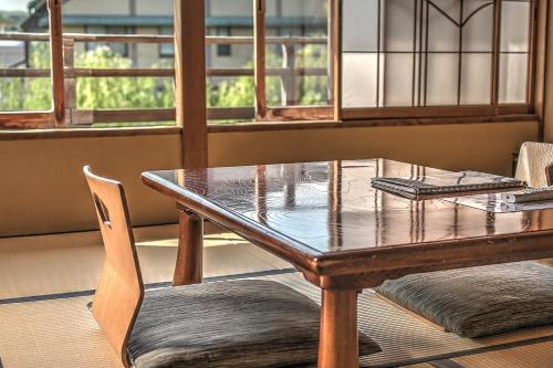 Imagen de la habitación del Ryokan Historical Hostel K's House Ito Onsen. Foto 8