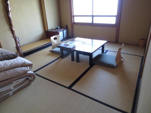 Imagen de la habitación del Ryokan Historical Hostel K's House Ito Onsen. Foto 9