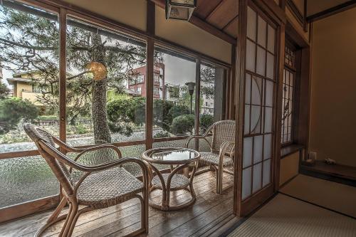 Imagen general del Ryokan Historical Hostel K's House Ito Onsen. Foto 4