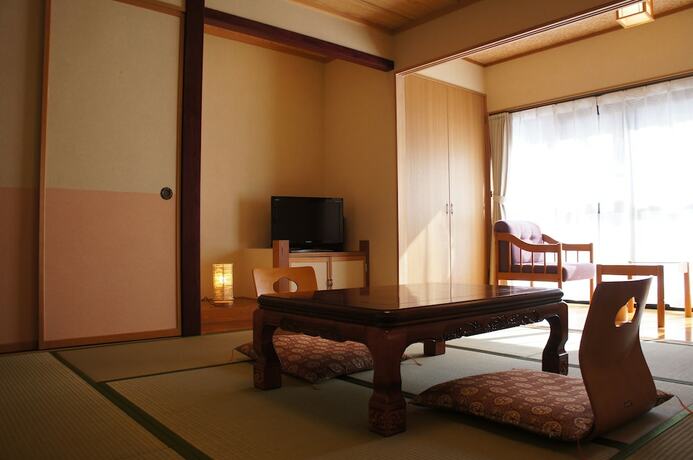 Imagen de la habitación del Ryokan Kakeyu Onsen Kutsurogi No Yado Kuroiwa. Foto 15